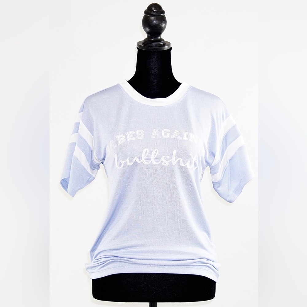 Understated Leather “BABES AGAINST BULLSH*T” slinky tee in powder blue (small)